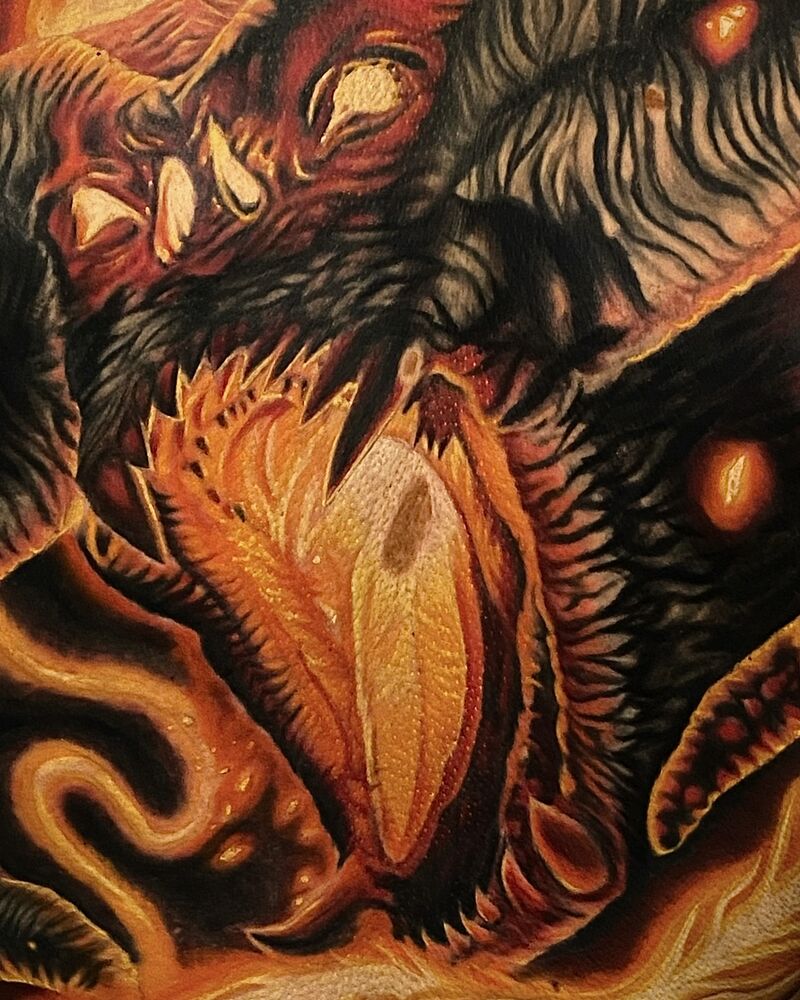 Primer plano del Balrog, entre el fuego y la sombra.
